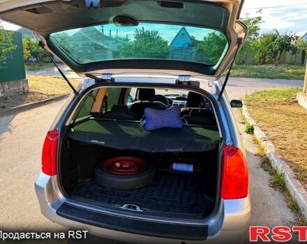 Серый Пежо 307, объемом двигателя 2 л и пробегом 387 тыс. км за 3500 $, фото 6 на Automoto.ua