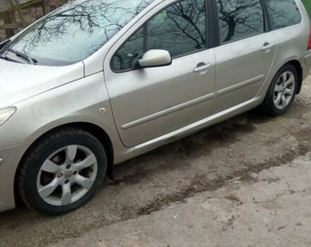 Серый Пежо 307, объемом двигателя 2 л и пробегом 302 тыс. км за 5100 $, фото 2 на Automoto.ua