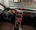 Серый Пежо 307, объемом двигателя 1.6 л и пробегом 306 тыс. км за 2849 $, фото 4 на Automoto.ua
