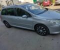 Серый Пежо 307, объемом двигателя 1.6 л и пробегом 245 тыс. км за 5300 $, фото 1 на Automoto.ua