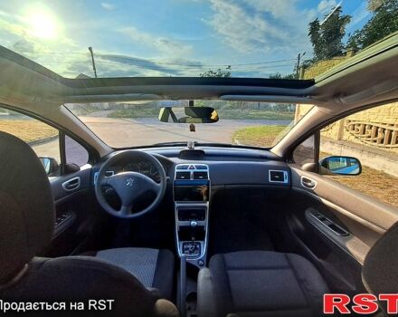 Серый Пежо 307, объемом двигателя 2 л и пробегом 387 тыс. км за 3500 $, фото 7 на Automoto.ua