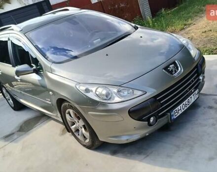 Серый Пежо 307, объемом двигателя 2 л и пробегом 310 тыс. км за 5300 $, фото 1 на Automoto.ua