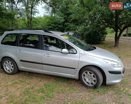 Серый Пежо 307, объемом двигателя 1.56 л и пробегом 286 тыс. км за 4500 $, фото 1 на Automoto.ua