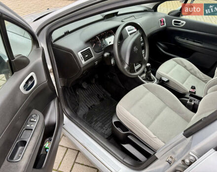 Серый Пежо 307, объемом двигателя 2 л и пробегом 210 тыс. км за 3950 $, фото 7 на Automoto.ua