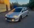 Серый Пежо 307, объемом двигателя 1.56 л и пробегом 312 тыс. км за 4200 $, фото 1 на Automoto.ua