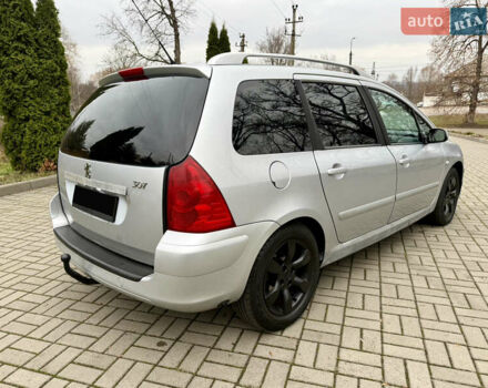 Серый Пежо 307, объемом двигателя 2 л и пробегом 210 тыс. км за 3950 $, фото 4 на Automoto.ua