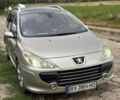 Серый Пежо 307, объемом двигателя 1.6 л и пробегом 303 тыс. км за 4200 $, фото 1 на Automoto.ua