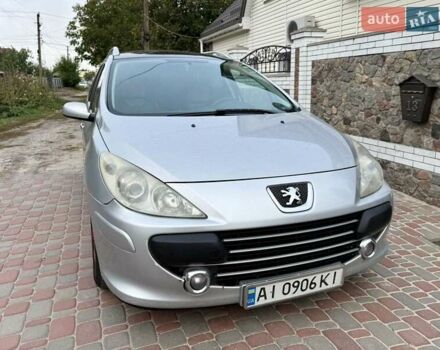 Серый Пежо 307, объемом двигателя 2 л и пробегом 309 тыс. км за 3650 $, фото 4 на Automoto.ua