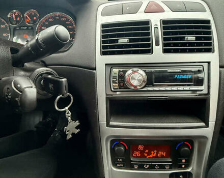 Серый Пежо 307, объемом двигателя 2 л и пробегом 210 тыс. км за 3950 $, фото 14 на Automoto.ua
