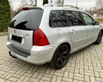 Серый Пежо 307, объемом двигателя 2 л и пробегом 210 тыс. км за 3950 $, фото 2 на Automoto.ua