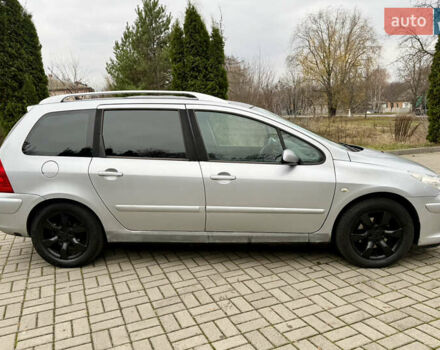 Серый Пежо 307, объемом двигателя 2 л и пробегом 210 тыс. км за 3950 $, фото 5 на Automoto.ua