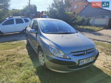 Сірий Пежо 307, об'ємом двигуна 1.36 л та пробігом 213 тис. км за 2600 $, фото 1 на Automoto.ua