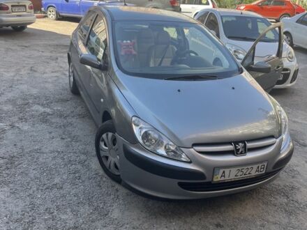 Сірий Пежо 307, об'ємом двигуна 1.4 л та пробігом 230 тис. км за 2000 $, фото 1 на Automoto.ua