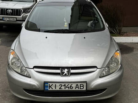 Серый Пежо 307, объемом двигателя 2 л и пробегом 255 тыс. км за 4400 $, фото 1 на Automoto.ua