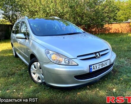 Серый Пежо 307, объемом двигателя 1.6 л и пробегом 247 тыс. км за 3650 $, фото 1 на Automoto.ua