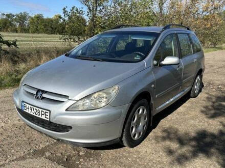 Серый Пежо 307, объемом двигателя 1.4 л и пробегом 240 тыс. км за 3500 $, фото 1 на Automoto.ua
