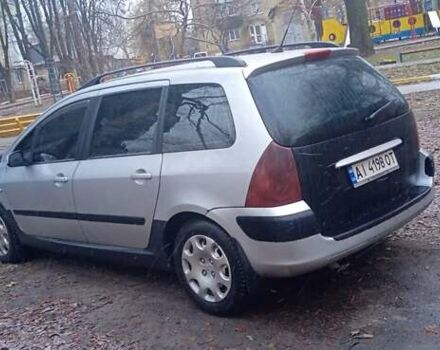 Серый Пежо 307, объемом двигателя 1.4 л и пробегом 333 тыс. км за 3100 $, фото 1 на Automoto.ua