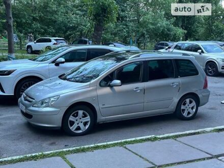 Сірий Пежо 307, об'ємом двигуна 1.99 л та пробігом 275 тис. км за 5500 $, фото 1 на Automoto.ua