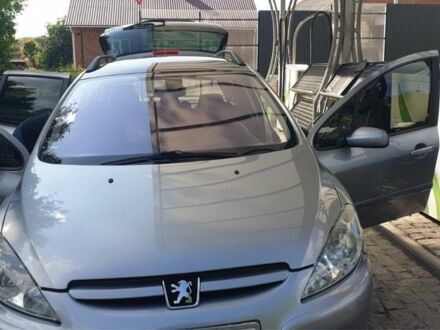Серый Пежо 307, объемом двигателя 1.6 л и пробегом 248 тыс. км за 4000 $, фото 1 на Automoto.ua