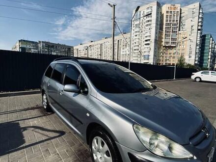 Серый Пежо 307, объемом двигателя 1.36 л и пробегом 235 тыс. км за 4000 $, фото 1 на Automoto.ua