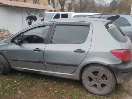 Серый Пежо 307, объемом двигателя 2 л и пробегом 300 тыс. км за 1120 $, фото 1 на Automoto.ua