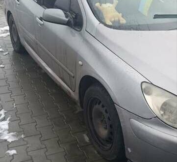 Серый Пежо 307, объемом двигателя 2 л и пробегом 385 тыс. км за 2000 $, фото 1 на Automoto.ua