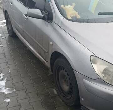 Серый Пежо 307, объемом двигателя 2 л и пробегом 385 тыс. км за 2000 $, фото 1 на Automoto.ua