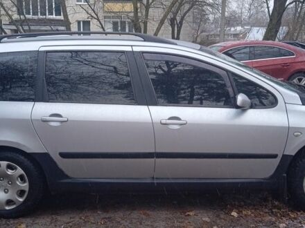 Сірий Пежо 307, об'ємом двигуна 1.4 л та пробігом 333 тис. км за 2800 $, фото 1 на Automoto.ua