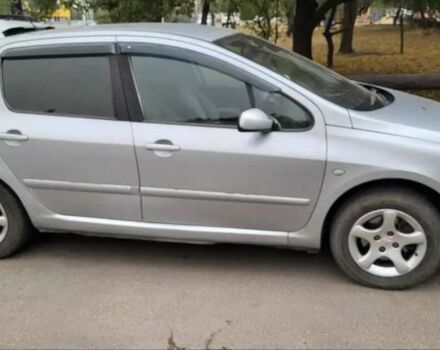 Серый Пежо 307, объемом двигателя 1.6 л и пробегом 288 тыс. км за 4000 $, фото 1 на Automoto.ua