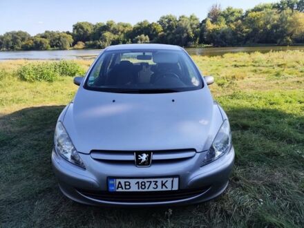 Серый Пежо 307, объемом двигателя 1.6 л и пробегом 139 тыс. км за 4750 $, фото 1 на Automoto.ua