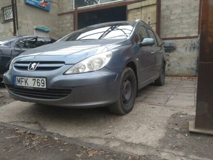 Сірий Пежо 307, об'ємом двигуна 1.6 л та пробігом 302 тис. км за 1600 $, фото 1 на Automoto.ua