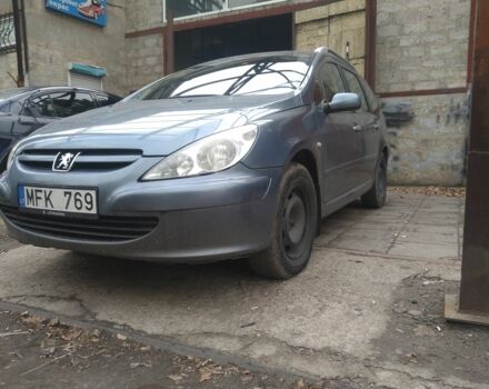 Серый Пежо 307, объемом двигателя 1.6 л и пробегом 302 тыс. км за 1600 $, фото 1 на Automoto.ua