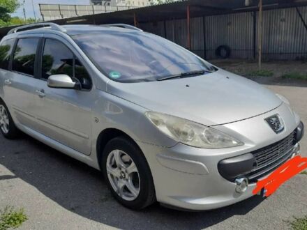 Серый Пежо 307, объемом двигателя 1.6 л и пробегом 245 тыс. км за 4300 $, фото 1 на Automoto.ua