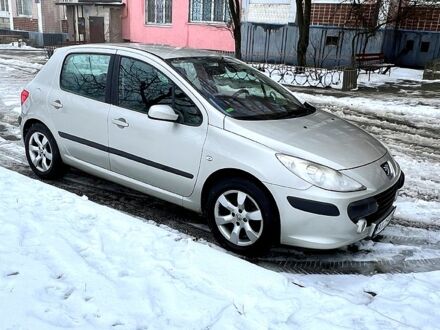 Серый Пежо 307, объемом двигателя 2 л и пробегом 230 тыс. км за 6200 $, фото 1 на Automoto.ua