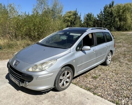 Серый Пежо 307, объемом двигателя 2 л и пробегом 230 тыс. км за 1301 $, фото 1 на Automoto.ua