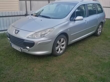 Серый Пежо 307, объемом двигателя 1.6 л и пробегом 260 тыс. км за 4300 $, фото 1 на Automoto.ua