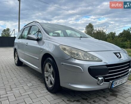 Серый Пежо 307, объемом двигателя 1.6 л и пробегом 300 тыс. км за 3600 $, фото 1 на Automoto.ua