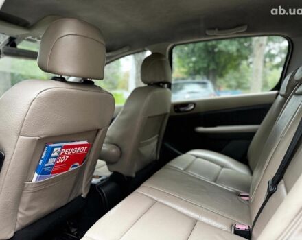 Синій Пежо 307, об'ємом двигуна 2 л та пробігом 296 тис. км за 3590 $, фото 17 на Automoto.ua