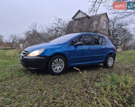 Синий Пежо 307, объемом двигателя 1.4 л и пробегом 286 тыс. км за 1950 $, фото 3 на Automoto.ua