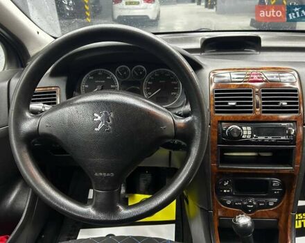 Синій Пежо 307, об'ємом двигуна 2 л та пробігом 260 тис. км за 3900 $, фото 9 на Automoto.ua