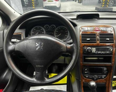 Синий Пежо 307, объемом двигателя 2 л и пробегом 260 тыс. км за 3900 $, фото 9 на Automoto.ua