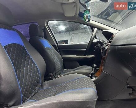Синій Пежо 307, об'ємом двигуна 2 л та пробігом 260 тис. км за 3900 $, фото 19 на Automoto.ua