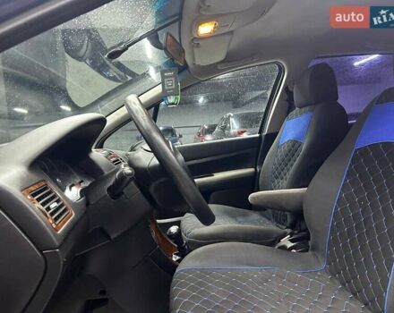 Синій Пежо 307, об'ємом двигуна 2 л та пробігом 260 тис. км за 3900 $, фото 6 на Automoto.ua
