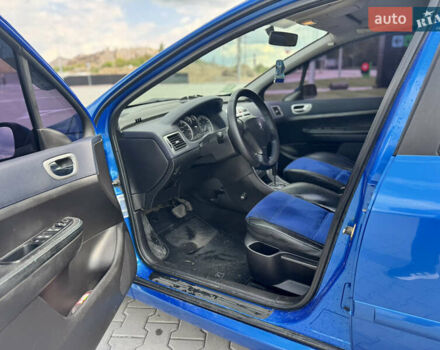 Синий Пежо 307, объемом двигателя 1.59 л и пробегом 247 тыс. км за 4100 $, фото 9 на Automoto.ua