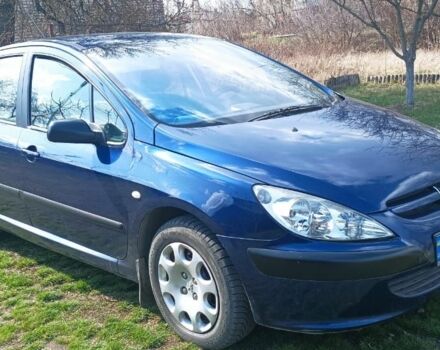 Синий Пежо 307, объемом двигателя 1.6 л и пробегом 300 тыс. км за 4500 $, фото 1 на Automoto.ua