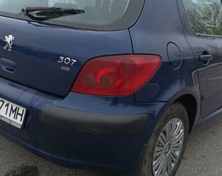 Синій Пежо 307, об'ємом двигуна 2 л та пробігом 434 тис. км за 3000 $, фото 3 на Automoto.ua