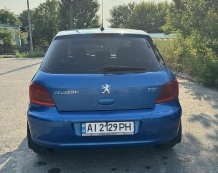 Синий Пежо 307, объемом двигателя 2 л и пробегом 235 тыс. км за 3900 $, фото 4 на Automoto.ua