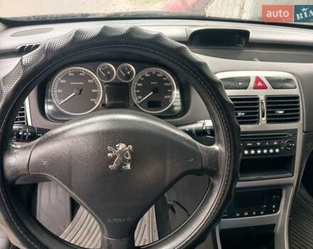 Синий Пежо 307, объемом двигателя 2 л и пробегом 265 тыс. км за 3650 $, фото 11 на Automoto.ua