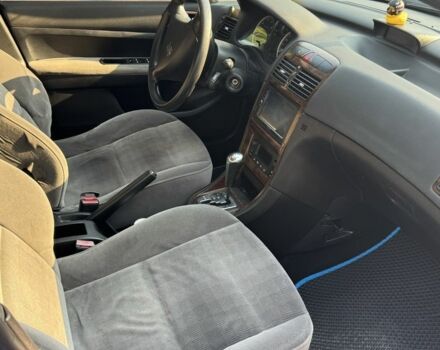 Синий Пежо 307, объемом двигателя 2 л и пробегом 235 тыс. км за 3900 $, фото 7 на Automoto.ua