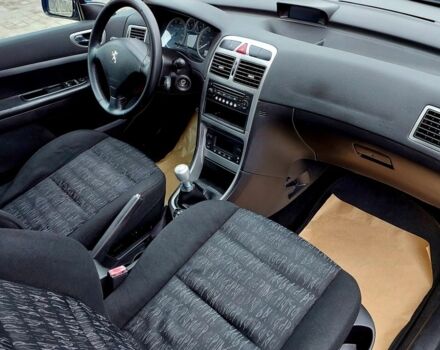 Синий Пежо 307, объемом двигателя 2 л и пробегом 264 тыс. км за 3500 $, фото 5 на Automoto.ua